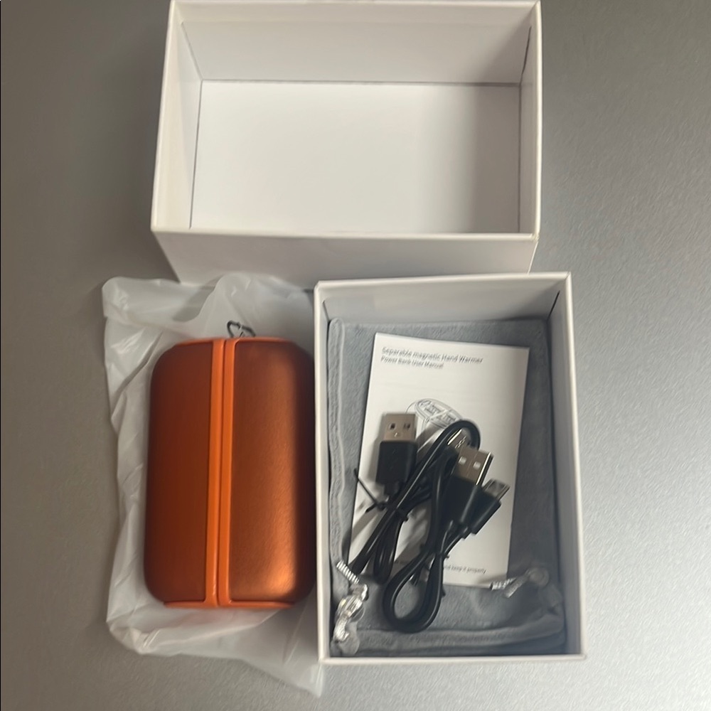 Orange Portable Hand Warmer with USB Cable